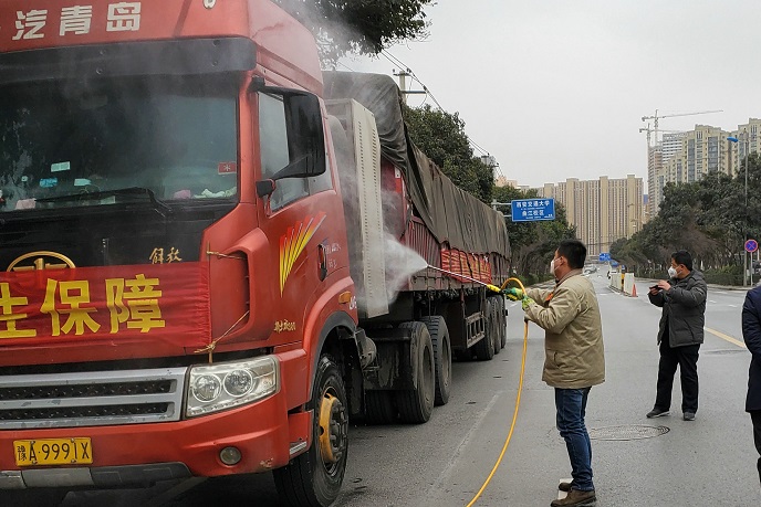 千磨万击还坚劲 齐心协力战疫情——配图.jpg